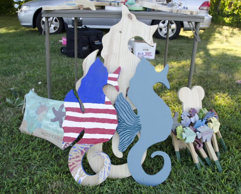 Mattapoisett resident Nicole Young's new business, Wicked Wood, is one of the vendors at the market. BY GEORGIA SPARLING